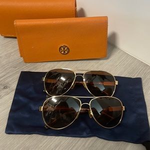 2 pairs of Tory Burch aviators.